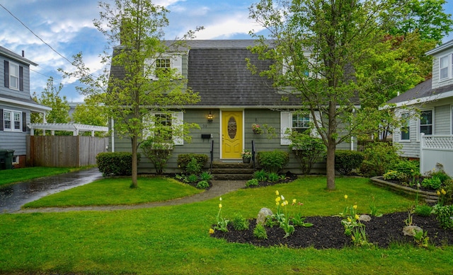 22 Vincent St, South Portland, ME 04106 - colonial inspired home featuring roof with shingles and driveway