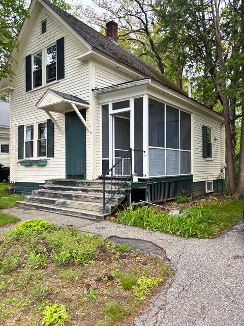 3 King St, Sanford, ME 04083 - view of front of property with a chimney and a sunroom