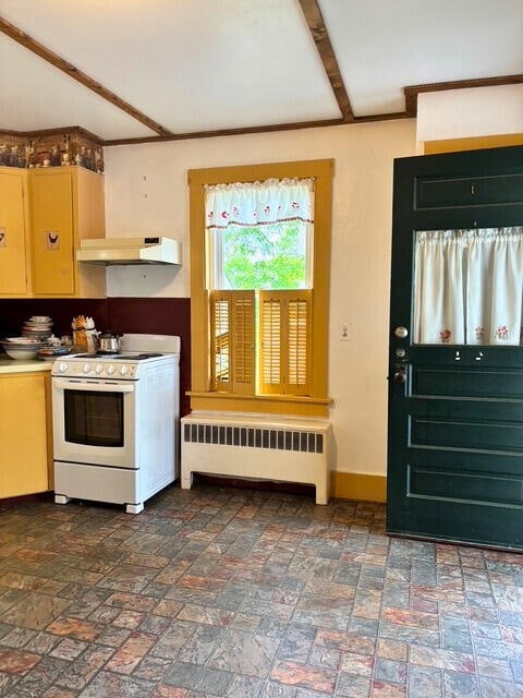 3 King St, Sanford, ME 04083 - kitchen featuring radiator, white range with electric stovetop, under cabinet range hood, and baseboards