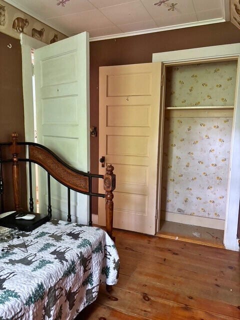 3 King St, Sanford, ME 04083 - bedroom featuring hardwood / wood-style floors, wallpapered walls, ornamental molding, and baseboards