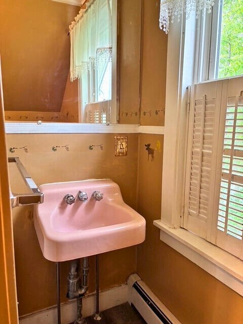 3 King St, Sanford, ME 04083 - bathroom with healthy amount of natural light, a baseboard heating unit, and a sink