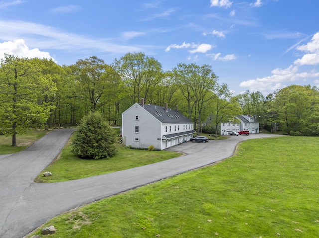 801 US Route 1 Unit C1, York, ME 03909 - view of front facade with a front yard and a chimney