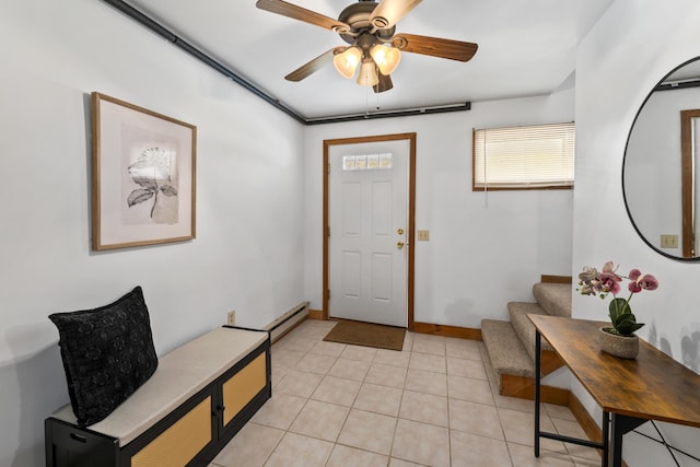 801 US Route 1 Unit C1, York, ME 03909 - entrance foyer with stairway, a ceiling fan, light tile patterned floors, and baseboards