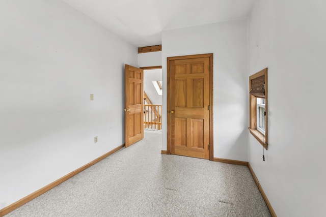 801 US Route 1 Unit C1, York, ME 03909 - unfurnished bedroom featuring baseboards and carpet flooring