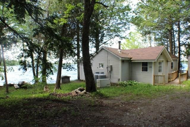 208 Camp Rd, Cooper, ME 04657 - view of side of home