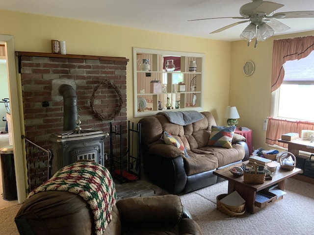 39 Oak St, Waterville, ME 04901 - living area featuring a ceiling fan and a wood stove