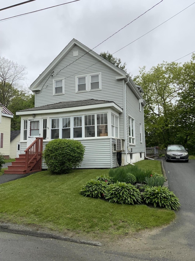 39 Oak St, Waterville, ME 04901 - view of front of house with a front yard and driveway