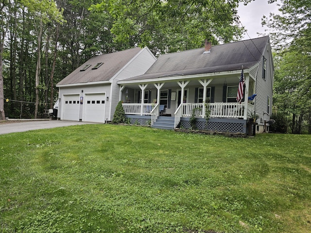 33 Oak Ridge Dr, Standish, ME 04084 - view of front of house with a porch, a chimney, a garage, driveway, and a front lawn
