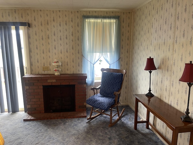 1 S Park St, Caribou, ME 04736 - sitting room with healthy amount of natural light, carpet floors, and a brick fireplace