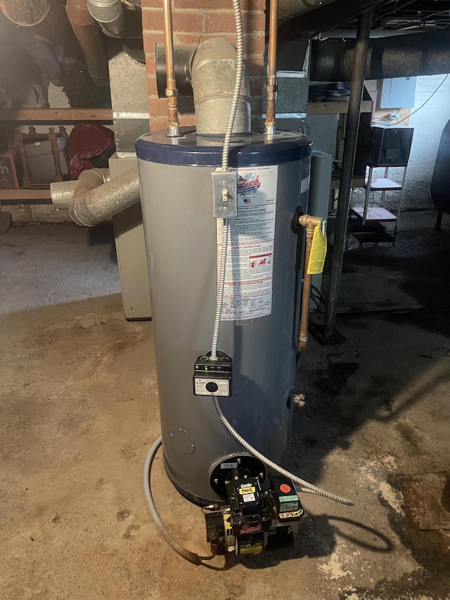 1 S Park St, Caribou, ME 04736 - utility room featuring gas water heater and oil tank