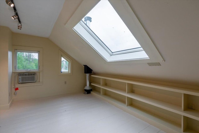 229 Choate Rd, Montville, ME 04941 - additional living space featuring vaulted ceiling, a skylight, and cooling unit