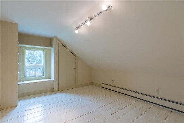 229 Choate Rd, Montville, ME 04941 - additional living space featuring a baseboard radiator and lofted ceiling