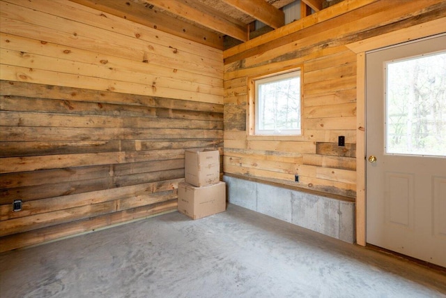 229 Choate Rd, Montville, ME 04941 - spare room featuring concrete flooring and wood walls