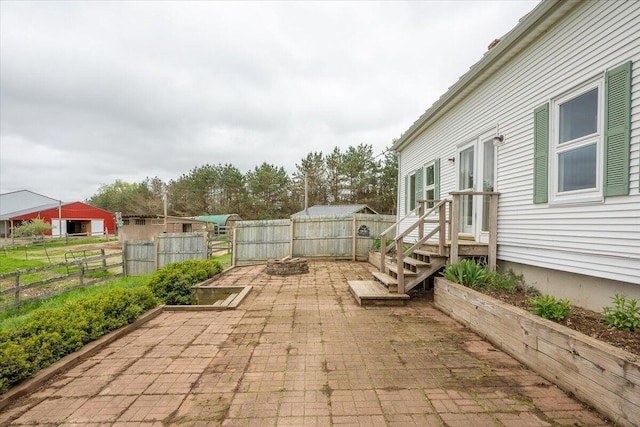229 Choate Rd, Montville, ME 04941 - fenced backyard featuring a patio