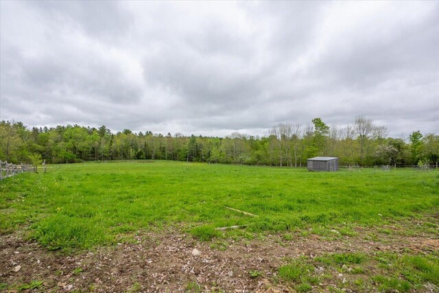 229 Choate Rd, Montville, ME 04941 - view of grassy yard featuring a wooded view and a view of countryside