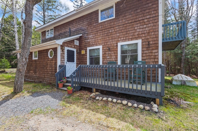 641 Bald Mountain Rd, Rangeley, ME 04970 - view of front facade with a wooden deck