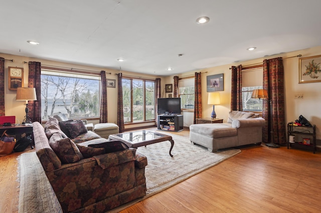 641 Bald Mountain Rd, Rangeley, ME 04970 - living area featuring light wood-type flooring, healthy amount of natural light, and recessed lighting