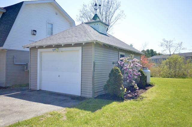 42 Blanchard St, Bangor, ME 04401 - detached garage featuring asphalt driveway