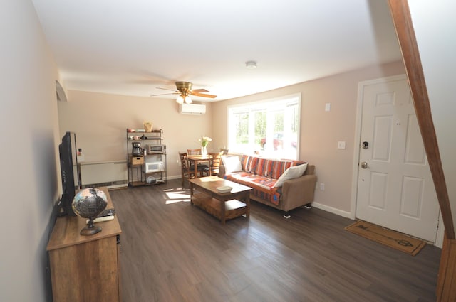 42 Blanchard St, Bangor, ME 04401 - living area with dark wood-type flooring, a ceiling fan, baseboards, and a wall mounted AC