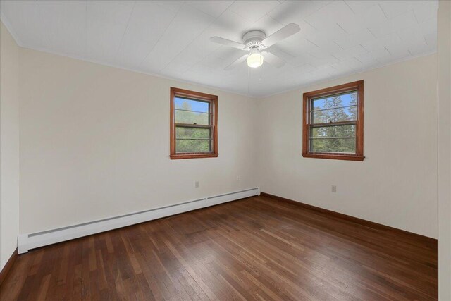 626 Main Rd, Eddington, ME 04428 - spare room featuring a baseboard radiator, plenty of natural light, wood-type flooring, and ceiling fan
