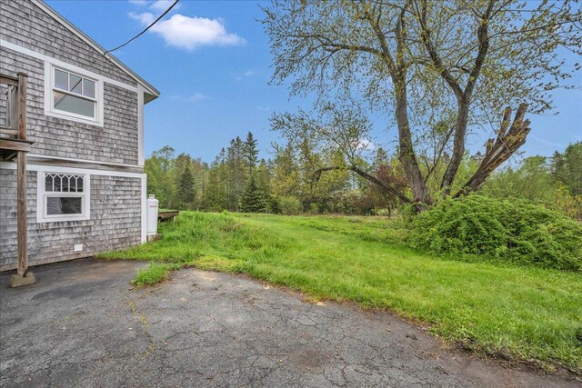 626 Main Rd, Eddington, ME 04428 - view of yard featuring a patio