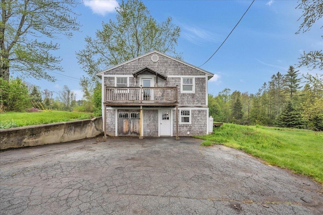 626 Main Rd, Eddington, ME 04428 - view of front facade featuring a wooden deck and a front lawn