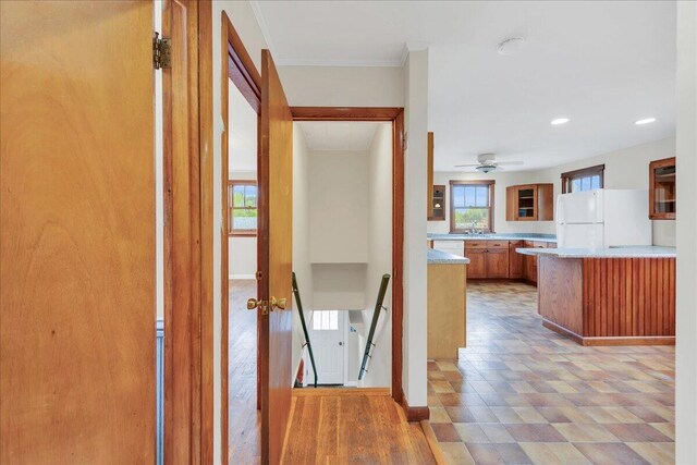 626 Main Rd, Eddington, ME 04428 - hallway featuring a sink, recessed lighting, and baseboards