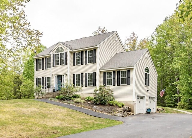 77 Cemetery Rd, Berwick, ME 03901 - colonial-style house with a garage, driveway, and a front lawn