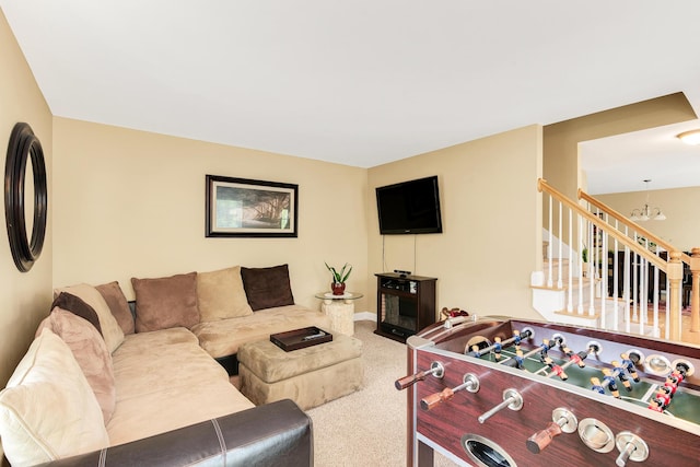 77 Cemetery Rd, Berwick, ME 03901 - living room featuring carpet flooring, stairs, and a chandelier