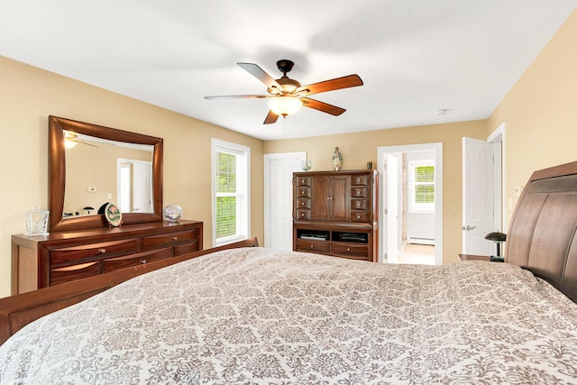 77 Cemetery Rd, Berwick, ME 03901 - bedroom featuring a baseboard heating unit and ceiling fan