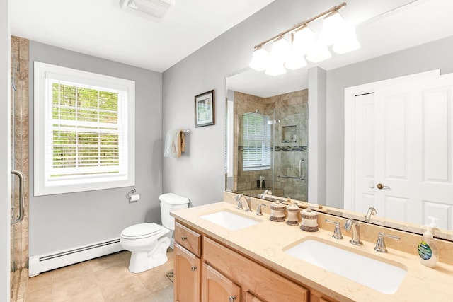 77 Cemetery Rd, Berwick, ME 03901 - full bathroom featuring baseboard heating, a shower stall, tile patterned floors, toilet, and double vanity