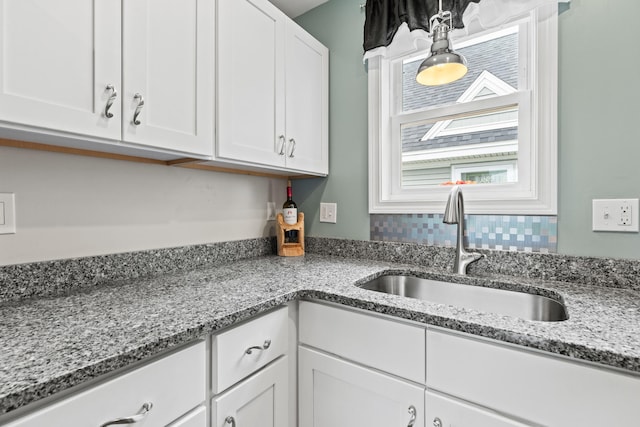 994 Portland Rd Unit 30, Saco, ME 04072 - kitchen featuring a sink, white cabinetry, and light stone counters