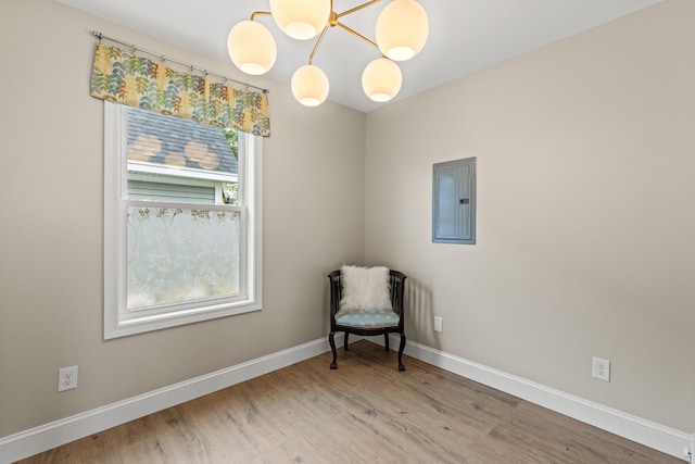 994 Portland Rd Unit 30, Saco, ME 04072 - unfurnished room with electric panel, wood finished floors, and baseboards