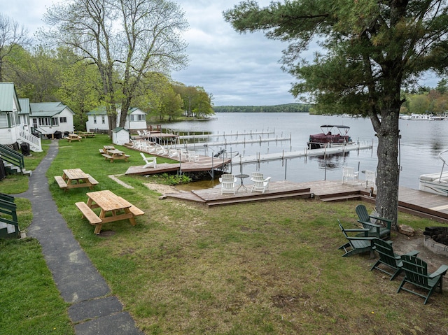 750 Roosevelt Trl Unit 7, Naples, ME 04055 - dock featuring a water view and a yard
