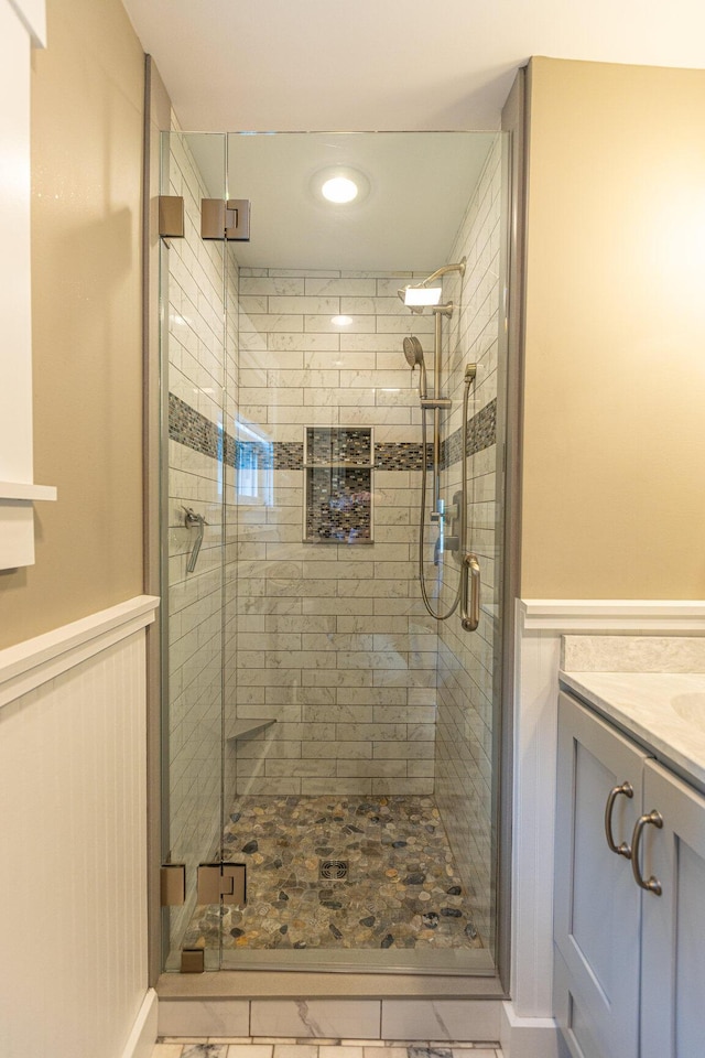 750 Roosevelt Trl Unit 7, Naples, ME 04055 - full bathroom featuring a shower stall, vanity, and recessed lighting