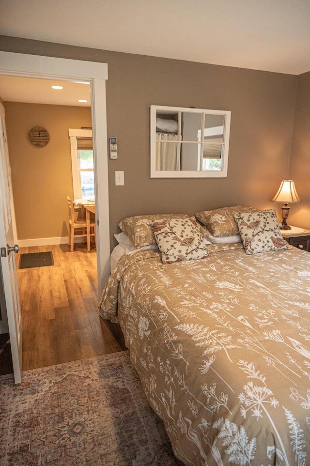 750 Roosevelt Trl Unit 7, Naples, ME 04055 - bedroom featuring wood finished floors and baseboards