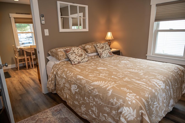 750 Roosevelt Trl Unit 7, Naples, ME 04055 - bedroom featuring wood finished floors and baseboards