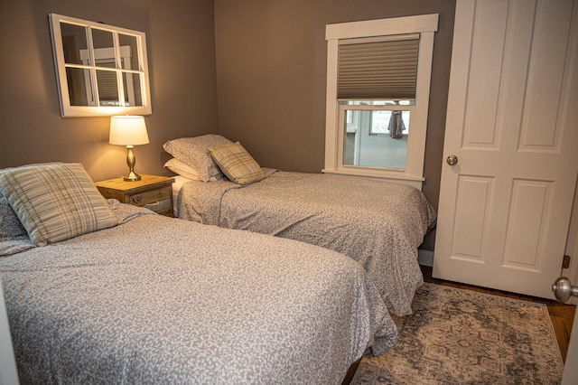 750 Roosevelt Trl Unit 7, Naples, ME 04055 - bedroom with wood finished floors