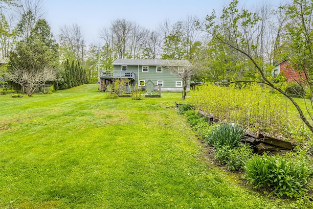 455 Duck Pond Rd, Westbrook, ME 04092 - view of green lawn featuring a wooden deck