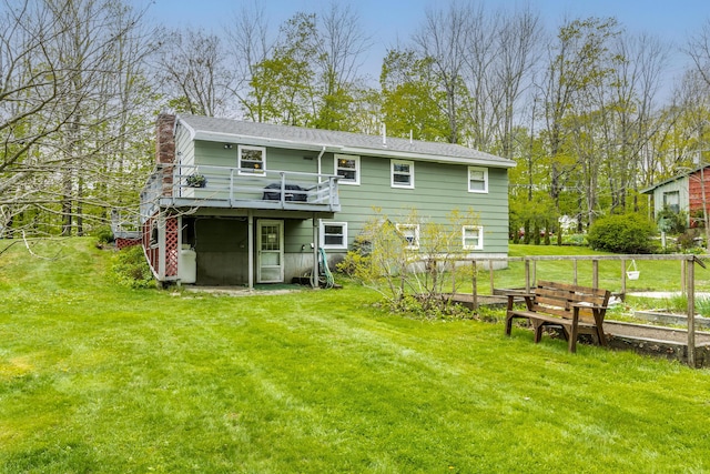 455 Duck Pond Rd, Westbrook, ME 04092 - rear view of house with a lawn, a chimney, and a deck