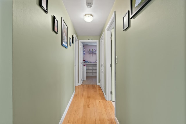 455 Duck Pond Rd, Westbrook, ME 04092 - hallway featuring light wood-style floors and baseboards