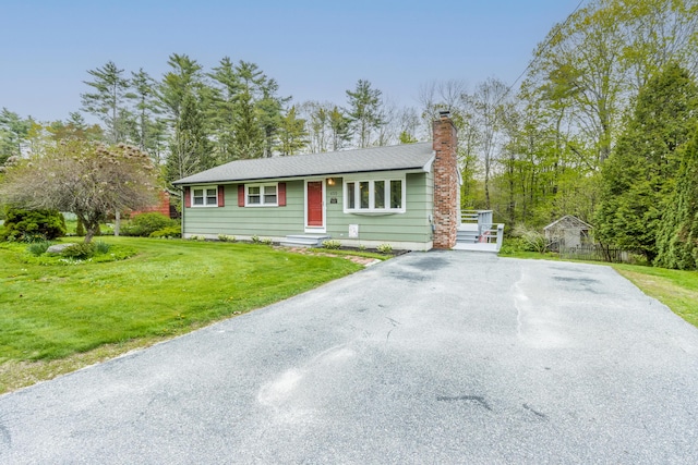 455 Duck Pond Rd, Westbrook, ME 04092 - ranch-style house with a chimney, a front lawn, and driveway
