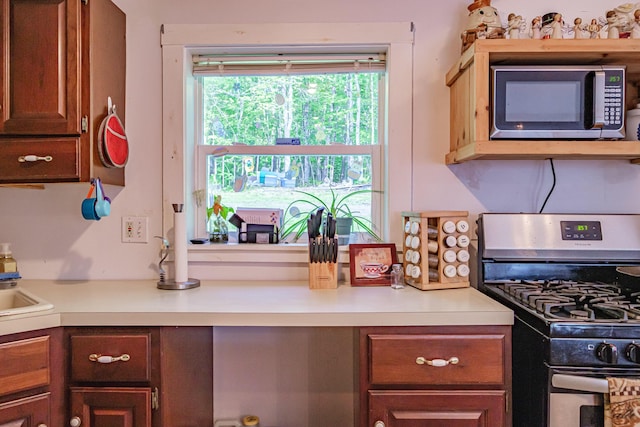 148 Naples Rd, Harrison, ME 04040 - kitchen featuring stainless steel appliances and light countertops