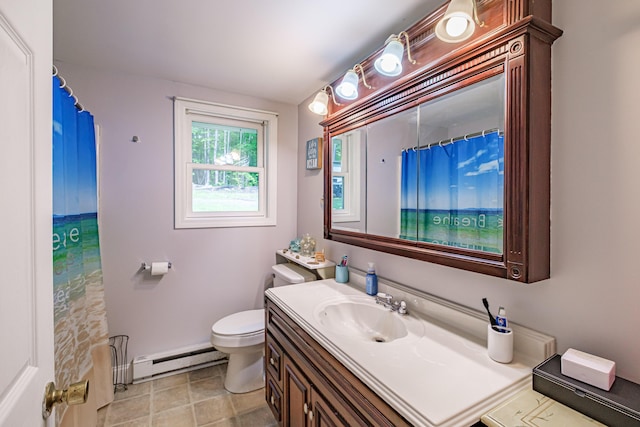 148 Naples Rd, Harrison, ME 04040 - full bathroom with a baseboard heating unit, toilet, vanity, baseboards, and tile patterned floors