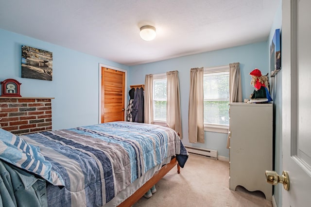 148 Naples Rd, Harrison, ME 04040 - carpeted bedroom featuring a baseboard radiator and a closet