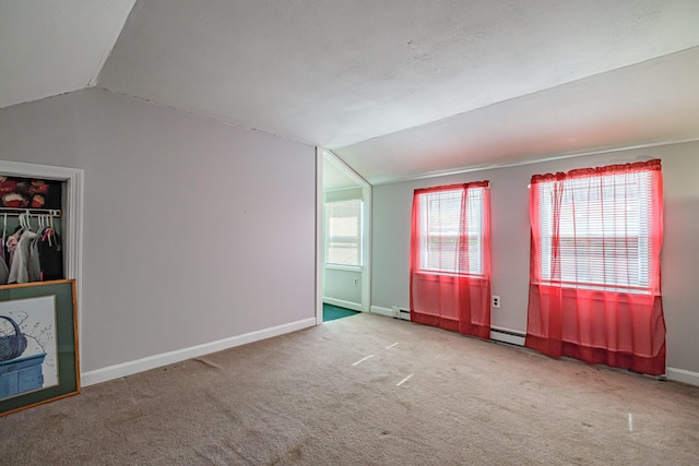 148 Naples Rd, Harrison, ME 04040 - unfurnished living room featuring lofted ceiling, carpet, baseboards, and a baseboard radiator