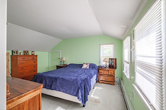 148 Naples Rd, Harrison, ME 04040 - bedroom with lofted ceiling, light carpet, and baseboard heating