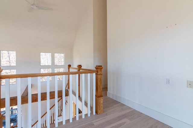 6065 Sandy River Cir, Carrabassett Valley, ME 04947 - stairway with wood finished floors and baseboards