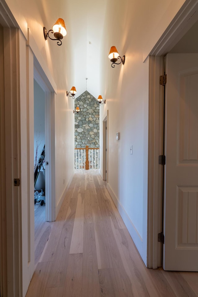 6065 Sandy River Cir, Carrabassett Valley, ME 04947 - hall with light wood-style flooring and baseboards