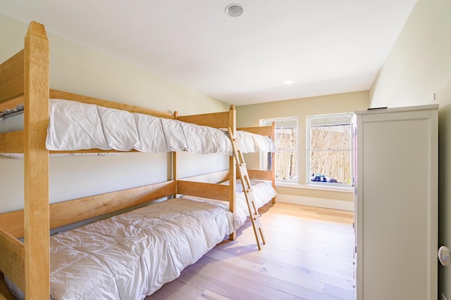6065 Sandy River Cir, Carrabassett Valley, ME 04947 - bedroom with wood finished floors and recessed lighting
